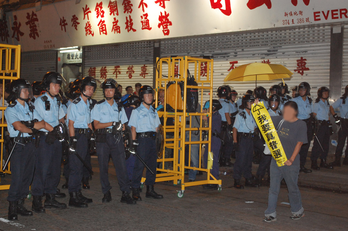 The “Occupy Central 9” Cases: Rule of Law or Rule by Law in Hong Kong?  