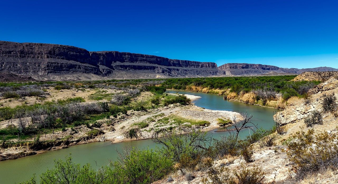 DOJ threatens to sue Texas over floating barriers on Rio Grande border