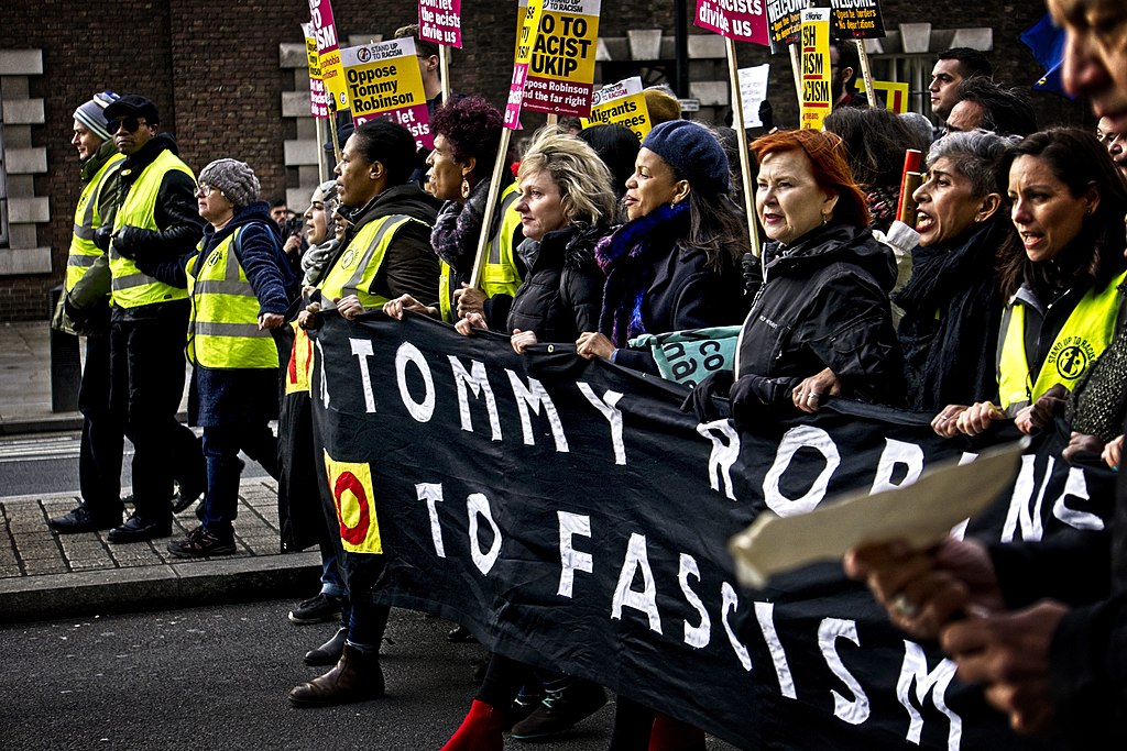 Far-right UK activist Tommy Robinson arrested under Terrorism Act 2000 following protest