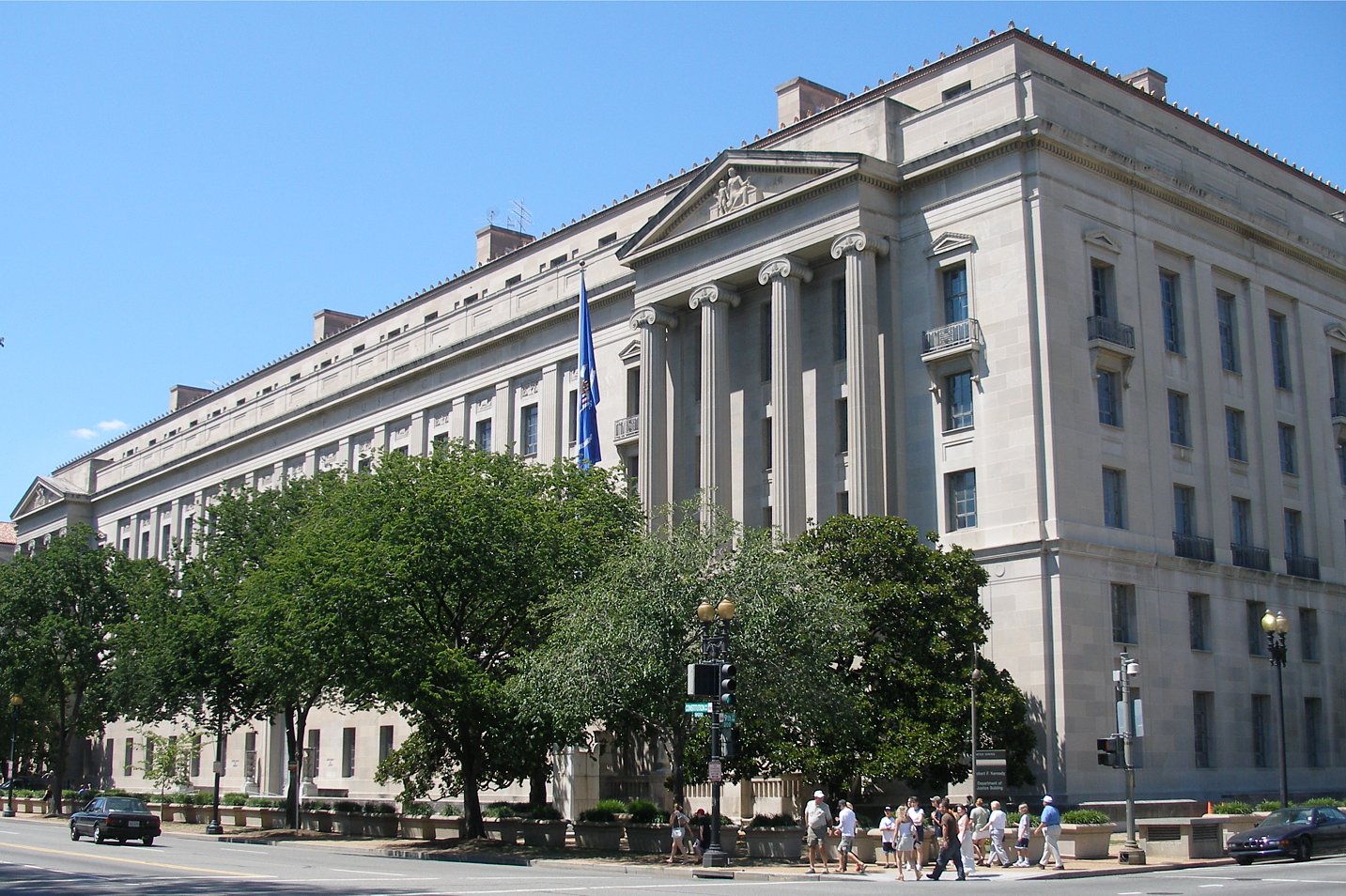 DOJ releases part of Russian probe internal memo, seeks to block release of full document